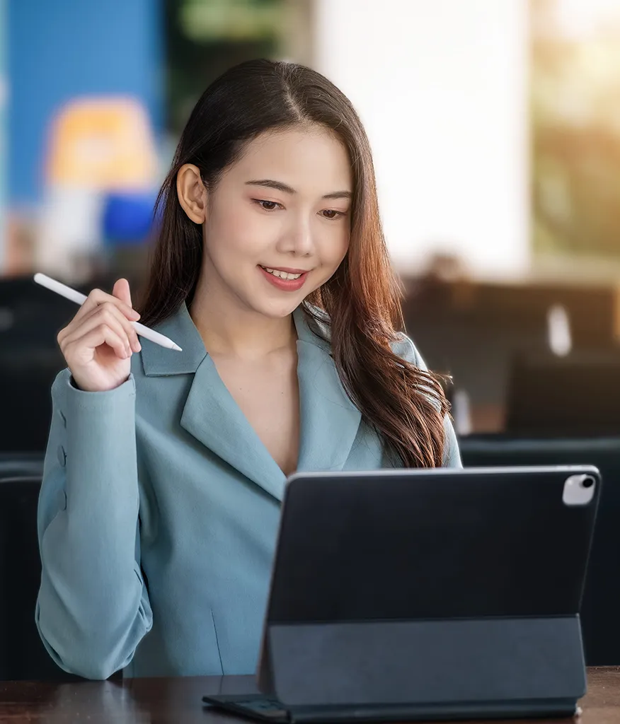 Adult learner upgrading skills online with support like SkillsFuture Credit, training allowance, course subsidies, and progression awards in Singapore