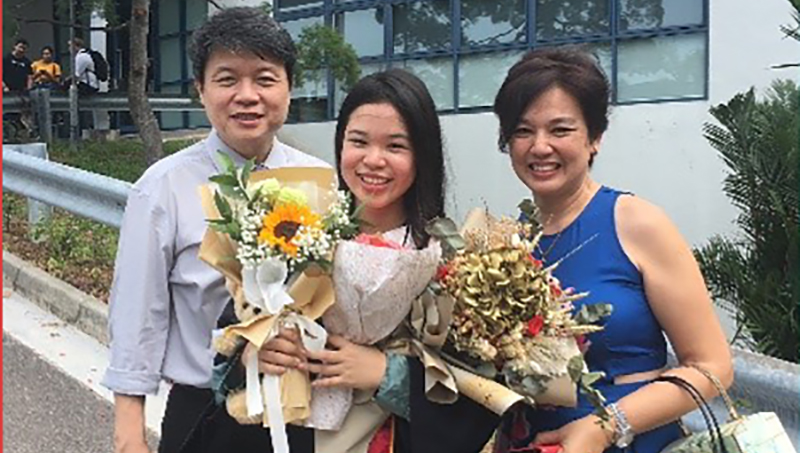 Temasek Polytechnic alumna with parents