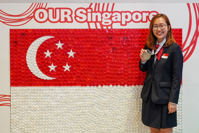 student representing Temasek Polytechnic at a competition