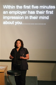 Madeline Lester giving a lecture